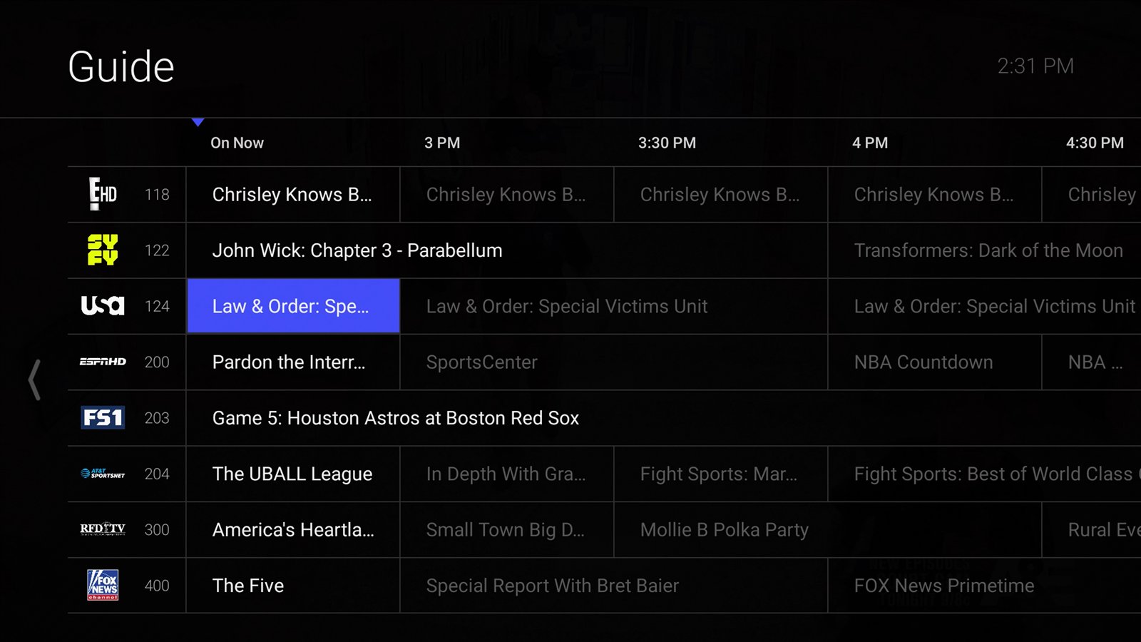 TV interface live guide with channel grid and program listings